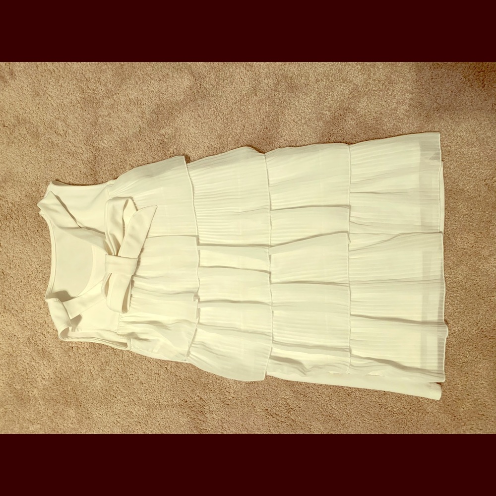 White pleat dress.
